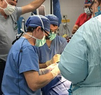 Dr. Lewis and Dr. Carrere performing surgery in Guatemala